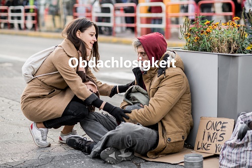 Hilfe für einen Obdachlosen
